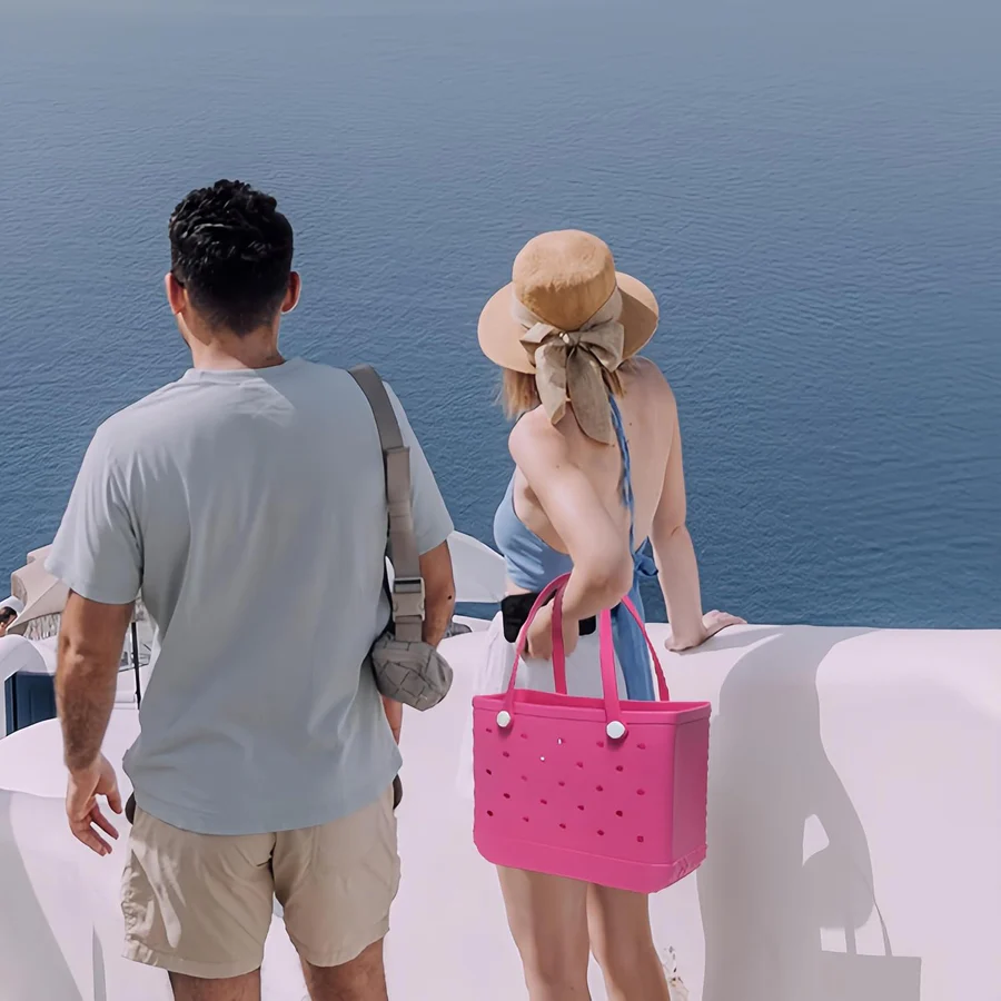 BlankifyCraft EVA beach tote bag in real beach setting — customer lifestyle with ocean backdrop