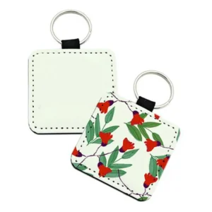 Square sublimation blank PU leather keychain before and after printing showing blank white pendant beside finished botanical red flower design with stainless steel ring